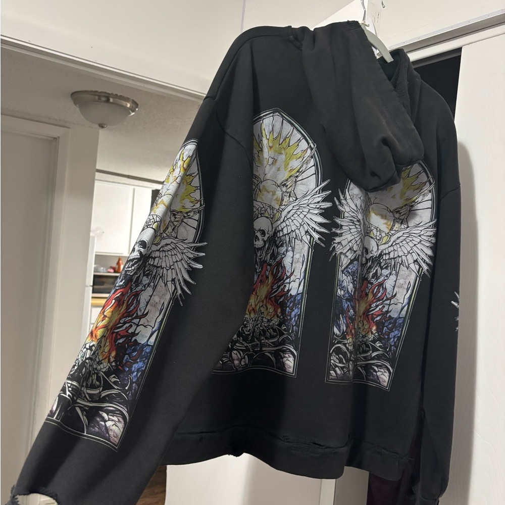 Black Graphic Winged Skull Hoodie with Colorful Stained-Glass Print